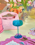 Ajio Luxe tablescape with beach blue coupe