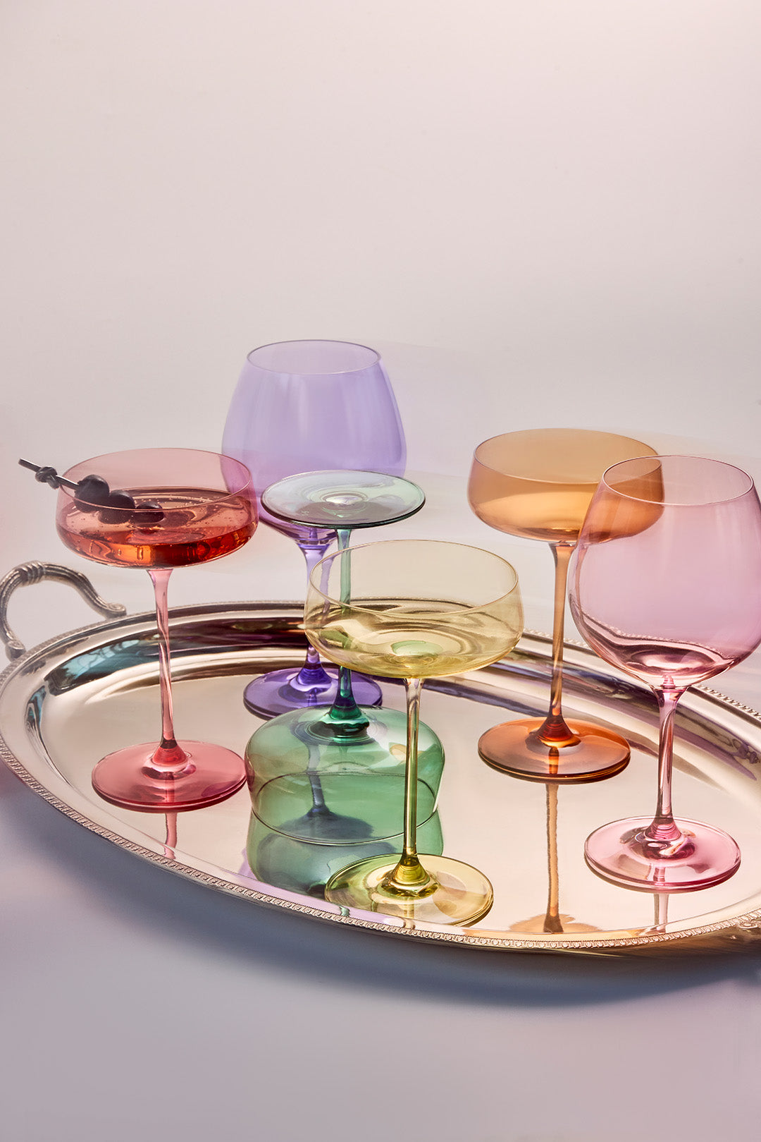 Six pastel coupe glasses in Rayt's pastel colours, boxed as a set